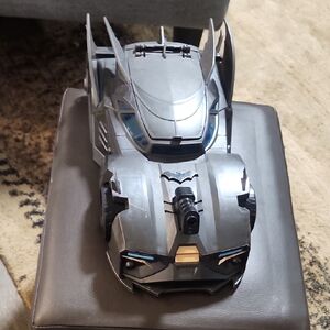 Stealthy Gray Bat-Inspired Toy Vehicle
